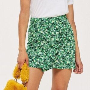 Green floral mini skirt, size 4